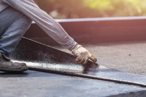 Professional Basement Waterproofing technician working in Carbon, IN